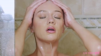 Blonde model caresses herself with foam in the Shower